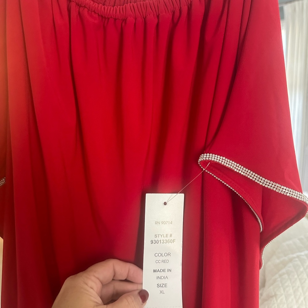 Red jumpsuit Great for holidays. Can fit xl or xxl